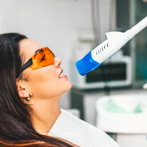 Dental patient receiving professional teeth whitening