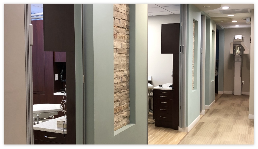 Hallway looking into dental treatment rooms