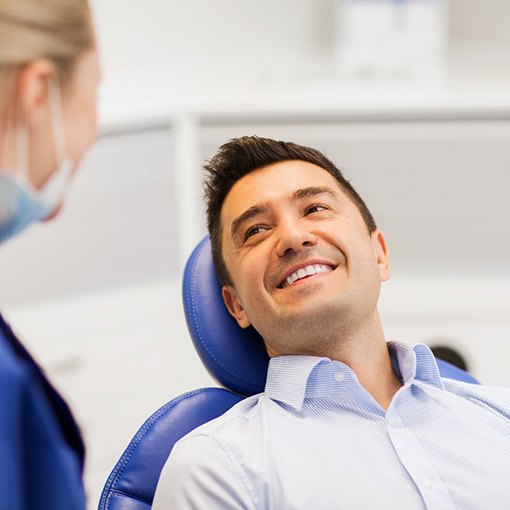 Man smiling at the dentist