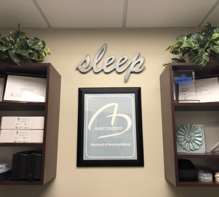 Sleep written on dental office wall where sleep apnea therapy is offered