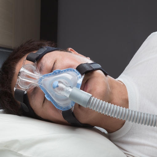 Patient sleeping soundly thanks to sleep apnea treatment