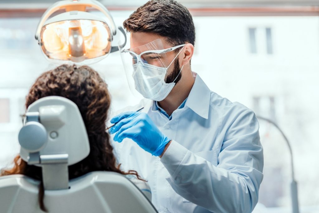 patient undergoing cosmetic bonding to fix their smile