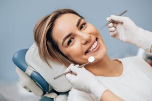 Woman smiling after modern cosmetic dental treatment