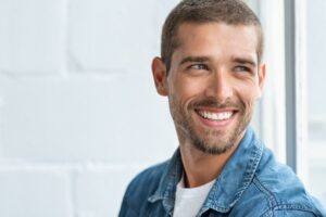 Man with aesthetic smile after cosmetic dentist work